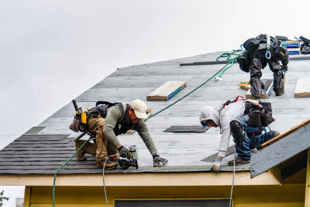 Professional Roofing technician working in Amityville, NY